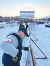 Volunteer Joe Kelly was out bright and early hanging sponsorship banners in the Iditarod chute on Mar 8 hours ahead of the mushers began the restart in Willow. Katie Stavick/Frontiersman
