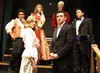 Charly Rentz plays Christine Daaé (in the white robe), Bronsen Stewart plays the Phantom (Black tux and white bow tie), Noah Valadez plays Firmin (black tux, purple accents), Isaac Cooley pla