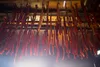 Strips of salmon are seen hanging in a smokehouse on the Kuskokwim River on July 19, 2017. Salmon has been a mainstay of diets in the region, providing high-quality protein that helps residen