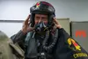 U.S. Air Force Gen. Ken Wilsbach, Pacific Air Forces commander, puts his helmet on at Royal Australian Air Force Base Tindal, Northern Territory, Australia, Sept. 5, 2022. Wilsbach visited Au