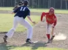 Wasilla's Jesse Thomas gets back to first base before the throw during an 11-1 win over Soldotna in the Southcentral Conference title game May 29 at Houston High School. Wasilla won its secon