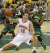 Wasilla senior Braydon Kuiper takes control of the ball under the basket during a state semifinal loss to Service at the Sullivan Arena in Anchorage. MatSuSports.net