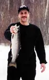 Peter Beck shows off the catch of the day during an ice fishing
outing last winter. Beck has lived in the Valley for four years,
and enjoys the outdoors. Submitted photo.