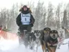 (ROBERT DeBERRY/Frontiersman Guillermo Anton, an exchange
student from Madrid, Spain, heads down the chute at the start of
the Junior Iditarod Sled Dog race Saturday in Willow. Anton is
mushi