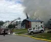 Firefighters are battling a structure fire in an eight-unit apartment complex on E. Snohomish Avenue, off Wasilla Fishhook. ANDREW WELLNER/Frontiersman.com