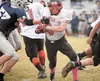 Houston senior Waylon Soptick breaks a tackle during a playoff loss to Soldotna. Soptick has been named first-team All-Northern Lights Conference on offense and defense. ROBERT DeBERRY/Fronti
