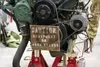 Soldiers assigned to the 109th Transportation Company, 17th Combat Sustainment Support Battalion, U.S. Army Alaska, remove a damaged engine from an M984A2 Heavy Expanded Mobility Tactical Tru