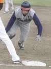 Dominick Comerate dives back toward first base during the Alaska
Road Warriors’ 9-6 win over the West Anchorage Eagles Saturday at
McManus Field in Wasilla. Comerate scored twice in the win.
