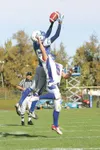 ROBERT DeBERRY/Frontiersman Palmer Moose Justin Draughon
completes a catch during Saturday's homecoming game against the
North Pole Patriots.
