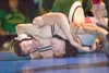 Wasilla wrestler Tyler Adams stands Service Cougar Jacob
Lunsford on his head during the 130 lb. championship match at
Saturday's lancer Smith Memorial Wrestling Tournament at Palmer
High Sch