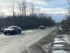 Traffic moves along Bogard Road near Engstrom Road in Palmer, a section that would receive a pedestrian walking and bike path under a proposed plan.  Amy Bushatz/For the Frontiersman