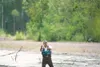 Frontiersman file photo Anchorage resident Robb Willie does some
midday fly fishing in Willow Creek upstream from the Parks
Highway.