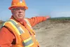 Alaska Railroad contracts manager Bob Hanson points to the route where the 32-mile Port MacKenzie Rail Extension will connect with the main line south of Houston. HEATHER A. RESZ/Frontiersman