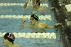 Colony's Gabe Vestri-Giovanni pumps his fist after his win in the 50-yard freestyle during the Region III Championships at the Palmer Pool. Vestri-Giovanni, an Italian foriegn exchange studen