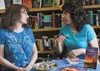 Author Shelly Jacobs speaks with a visitor during her book signing at Fireside Books in Palmer on Saturday. Jacobs' book is called 'A Mother's Meditations: Teachings of the Heart'. MATT HICKM