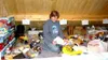Sue Ellen prepares her drop bags for each checkpoint recently.
The Houston musher is preparing for her first Iditarod. Photo by
JODI SNYDER/For the Frontiersman.