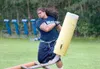 ROBERT DeBERRY/Frontiersman Junior Aumavae works out with a
blocking sled on the Palmer High School practice field recently.
Aumavae, a 2004 graduate of Palmer, is hoping to catch on with
ano