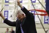 After three seasons as head coach of the Palmer High boys' basketball program, Chuck Martin has accepted the same position at East Anchorage High School. Martin, seen here cutting down the ne
