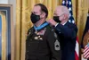 President Joseph R. Biden Jr. presents the Medal of Honor to U.S. Army Master Sgt. Earl D. Plumlee during a ceremony at the White House in Washington, D.C., Dec. 16, 2021. Master Sgt. Plumlee