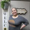 Laurie Lashlee poses for a photo inside Tracy's Treasures in downtown Wasilla. Jacob Mann/Frontiersman