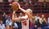 Wasilla sophomore guard Alysha Devine takes a foul as she drives
to the basket during a Wasilla win against the West High Eagles at
Wasilla High School. (ROBERT DeBERRY/Frontiersman)