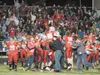 Wasilla lifts kicker Kyler Perry up after he scores the winning
point on a 29-yard field goal with four seconds to win the 33rd
Potato Bowl. ROBERT DeBERRY/Frontiersman