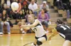 ROBERT DeBERRY/Frontiersman Colony Knight Jackie Hamann dives
for the save as Hannah Curtis backs her up during game one of the
First National Alaska and ASAA 4A Volleyball Championships Satu
