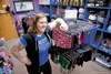 Stanislawa Wierzbicki, aka Shocker Khan, stands inside the 2N1 Skate Shoppe Saturday afternoon. Wierzbicki and her partner Justin Dieters opened the roller derby specialty store out of their 