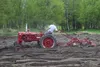Dick Sloan plows a field for David Dahms.JPG