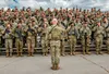 Lt. Col. James Raines, commander of 2nd Battalion, 18th Field Artillery Regiment, 75th Field Artillery Brigade, renders and receives a salute after completing a weeklong external evaluation M