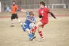 ROBERT DeBERRY/Frontiersman Wasilla senior Adam Friese and
Palmer sophmore Ben Ballard fight for control of the ball during
the second half of Monday's game at Palmer High School.