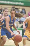ROBERT DeBERRY/Frontiersman Kaitlyn Klapperich scrambles for a
rebound during the Alaska Association of Basketball Coaches Senior
All-Star Game Saturday at Colony High School.