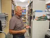 Mat-Su Central principal John Brown shows the school's various textbooks at the Wasilla campus, which is the main hub. Jacob Mann/Frontiersman