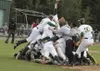 Mat-Su starting pitcher Justin Vernia takes a selfie from the top of the pile, as the Miners celebrate winning an Alaska Baseball League championship. The Miners used a 9-3 win over the Penin