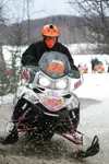 (ROBERT DeBERRY/Frontiersman) The 2010 Irod got underway Sunday
Feb. 21 on Big Lake. Jana Pevan powers off the lake and into the
woods during Sunday's start. Pevan and partner Tammy Barber ar