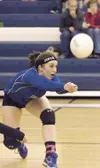 Kasara Brandenburg scrambles to make a save during Palmer’s win
over the Kodiak Bears at Palmer High School Friday. The Moose beat
the Bears again on Saturday to secure the No. 1 seed in this