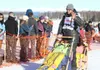 Willow's Wade Marrs waves to fans during the restart of the Iditarod Trail Sled Dog Race on Sunday, March 6, 2016, in Willow. The home of the 2017 Iditarod restart appears to be in question, 