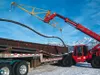A crane moves a bundle of rebar at J.D. Steel's Palmer plant.
The company is working hard to survive in an uncertain business.
Photo by STEVE KADEL/Frontiersman.
