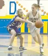 Colony senior Allie Grazulis moves around Skyview’s Brittany
Meyer and goes toward the basket during Colony’s 64-21 win over the
Panthers in the first round of the Northern Lights Conference

