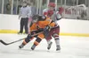 Wasilla’s Adam Apangalook pressures a West Anchorage Eagle during the a Thursday game at the ASAA/First National Cup hockey championships in Wasilla ROBERT DeBERRY/Frontiersman.com