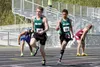 Jake Bartlemus takes the baton from Brandon Nicholson in a boys' relay event during the Colony Invitational Saturday at Colony High School. Mark Kelsey