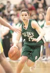 Colony guard Megan Bowker drives towards the basket during
Colony's 68-34 victory over the Homer Mariners Thursday at the
Northern Lights Conference Championship Tournament at Palmer High
Sch