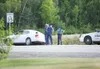 ROBERT DeBERRY/Frontiersman Officers with the Alaska State
Troopers make a DUI arrest in July along the Seward Meridian
Parkway. Troopers, along with the Palmer and Wasilla police
departments