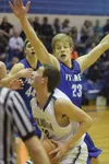 Palmer forward Clayton Southwick (23) puts a block on Soldotna sophomore Derek Evans Friday at Soldotna High School. Photo by Joey Klecka/Peninsula Clarion