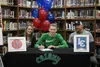 Colony High senior Colton Spencer, with his mom, Maisie, and dad, Luke, signed his National Letter of Intent to attend Lewis-Clark State College and play basketball. Tim Rockey/Frontiersman