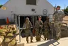 U.S. Air Force Tech. Sgt. James May, center, 319th Training Squadron PACER FORGE cadre, guides Airman Basic trainees through the first phase of Primary Agile Combat, Forward Operations Readin
