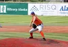 Palmer's Ben Alley fires a pitch during a 3-2 win over the South open squad Wednesday in Anchorage. Alley led the Pioneers to the Matson Invitational title. Tim Rockey/Frontiersman