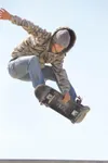 ROBERT DeBERRY/Frontiersman Erin Hogan boosts a mute grab up and
over the spine at the Wasilla Skatepark Monday afternoon. Wasilla
built the park in 1998 for about $233,000. The Palmer Skateb