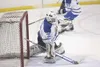 Palmer goalie Ashton good moves to stop a kenai shot on goal
during the Moose's win Friday night at the MTA Palmer Ice Arena
during the Region III Northstar Conference Hockey Championships.
(