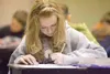 Colony Middle School student Taylor Bruce concentrates on her
writing Monday morning. (ROBERT DeBERRY/Frontiersman)